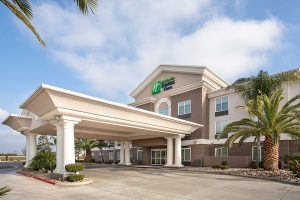 daylight exterior of Holiday Inn Express & Suites Yosemite Pk Chowchilla